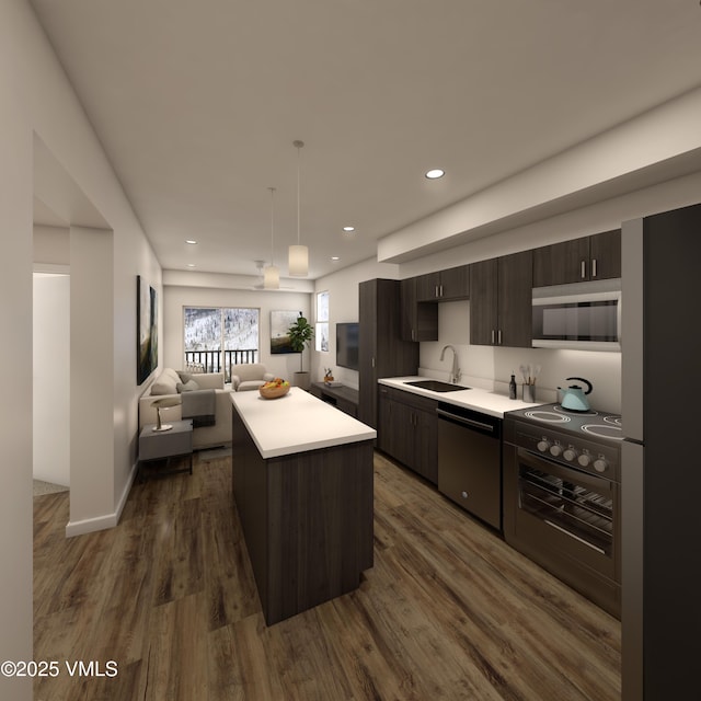 1281 N Frontage Rd W Unit A303, Vail, CO 81657 - kitchen with stainless steel dishwasher, range with electric stovetop, dark wood finished floors, light countertops, and a kitchen island