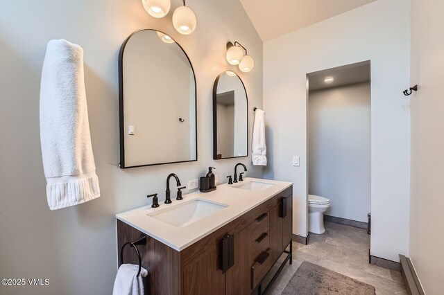 1750 S Frontage Rd W Unit E-3, Vail, CO 81657 - full bathroom featuring toilet and double vanity