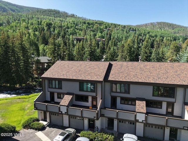 1750 S Frontage Rd W Unit E-3, Vail, CO 81657 - multi unit property with a forest view, a garage, a mountain view, and driveway