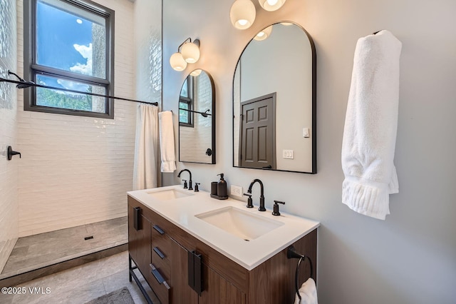 1750 S Frontage Rd W Unit E-3, Vail, CO 81657 - bathroom featuring tiled shower and double vanity