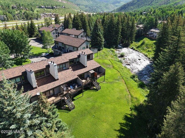 1750 S Frontage Rd W Unit E-3, Vail, CO 81657 - view of subject property with a heavily wooded area and a mountainous background