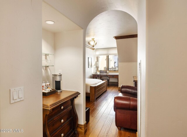 bedroom with wood-type flooring