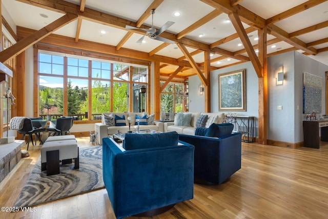 124 Grey Hawk Ln, Edwards, CO 81632 - living area featuring coffered ceiling, hardwood / wood-style flooring, plenty of natural light, beam ceiling, and ceiling fan