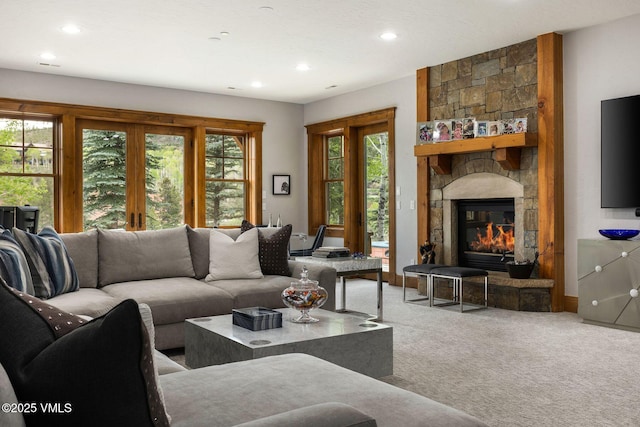 124 Grey Hawk Ln, Edwards, CO 81632 - living room with carpet flooring, recessed lighting, and a stone fireplace