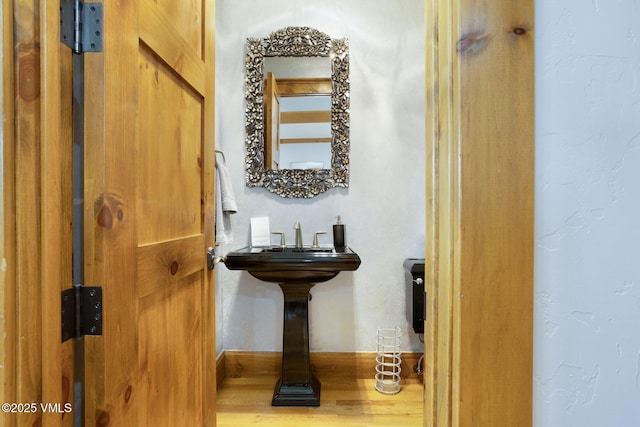 124 Grey Hawk Ln, Edwards, CO 81632 - bathroom featuring wood finished floors