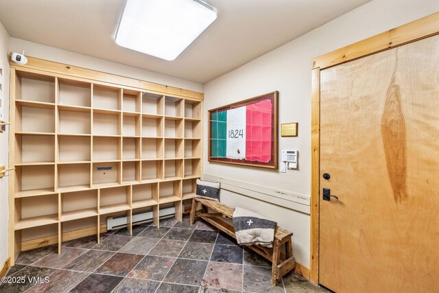 storage room with a baseboard radiator