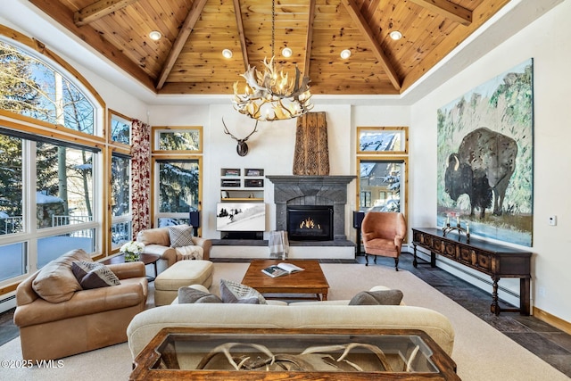 living room with a notable chandelier, a baseboard heating unit, wood ceiling, and high vaulted ceiling