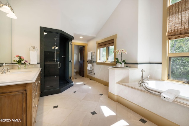 2005 Wildwood Rd, Avon, CO 81620 - full bathroom with a shower stall, vanity, healthy amount of natural light, a bath, and high vaulted ceiling