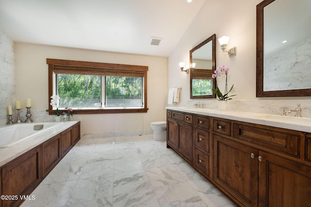 2005 Wildwood Rd, Avon, CO 81620 - full bathroom with double vanity, vaulted ceiling, a garden tub, and marble finish flooring