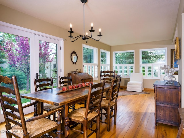 130 Morgan Dr Unit B, Edwards, CO 81632 - dining area with light wood-style flooring and a chandelier