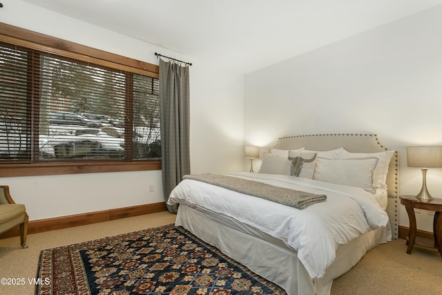 bedroom with light carpet