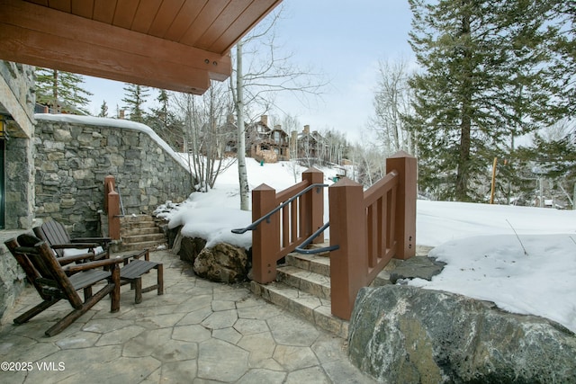 view of snow covered patio