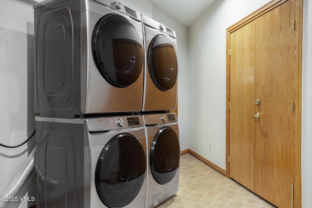 60 Elk Track Ct, Beaver Creek, CO 81620 - washroom featuring stacked washer / dryer and light flooring