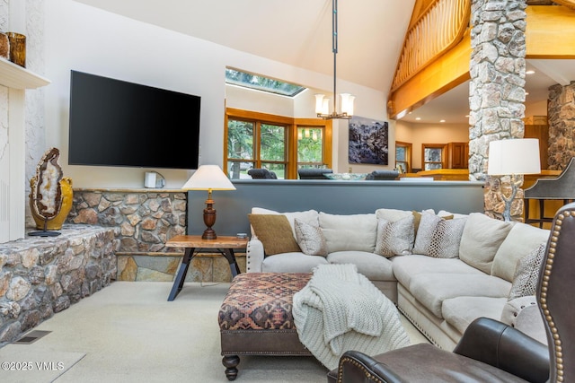 60 Elk Track Ct, Beaver Creek, CO 81620 - carpeted living room featuring a chandelier, high vaulted ceiling, and decorative columns
