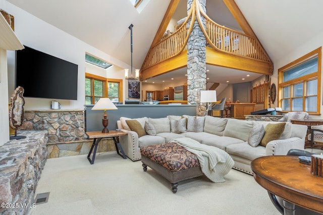 60 Elk Track Ct, Beaver Creek, CO 81620 - carpeted living area featuring high vaulted ceiling and ornate columns
