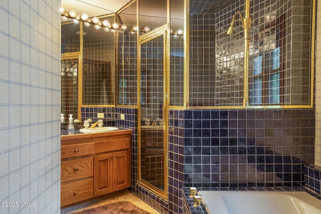 60 Elk Track Ct, Beaver Creek, CO 81620 - full bath with tile walls, vanity, a bath, and a tile shower