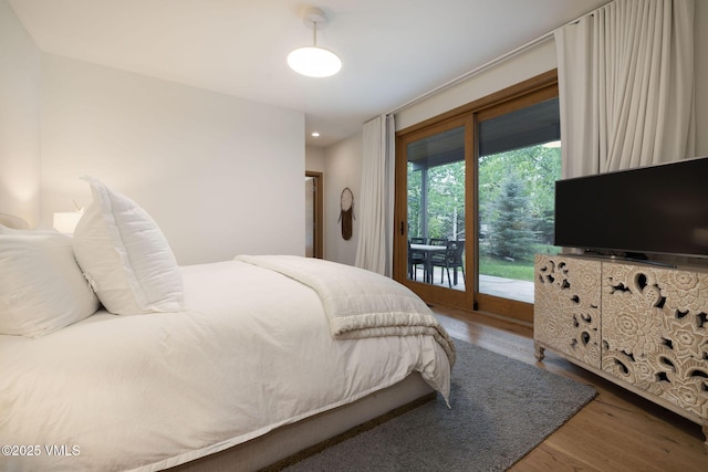 232 Stetson Dr, Edwards, CO 81632 - bedroom with access to outside and wood finished floors