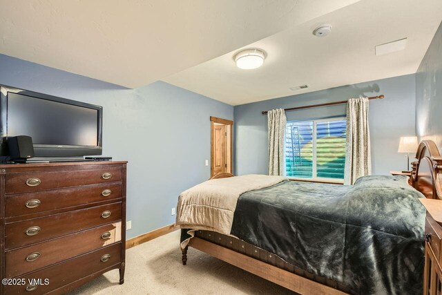 41 Wren Ct, Eagle, CO 81631 - bedroom featuring light colored carpet and baseboards