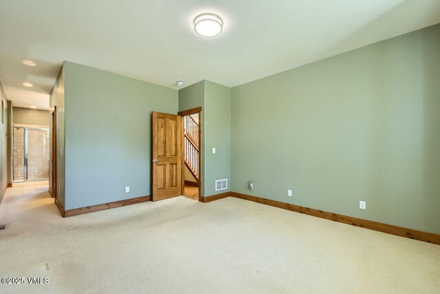 41 Wren Ct, Eagle, CO 81631 - unfurnished bedroom featuring light carpet, baseboards, and recessed lighting