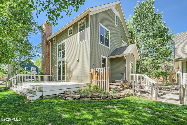 41 Wren Ct, Eagle, CO 81631 - rear view of house featuring a deck and a chimney