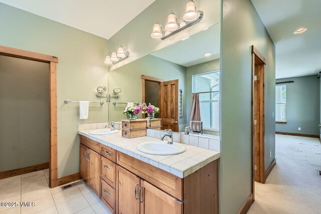 41 Wren Ct, Eagle, CO 81631 - full bathroom with baseboards and double vanity