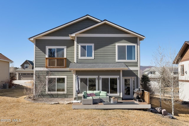 back of house with outdoor lounge area and central air condition unit