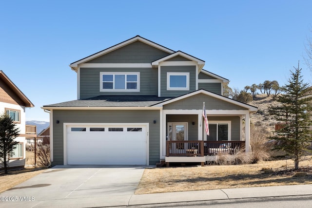 view of front of home featuring concrete driveway, an attached garage, covered porch, and a shingled roof