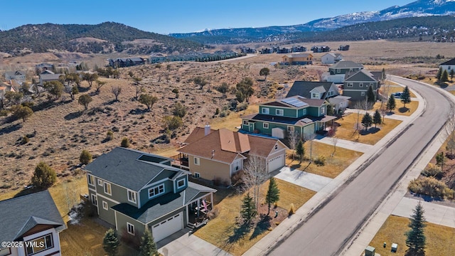 bird's eye view with a residential view and a mountain view