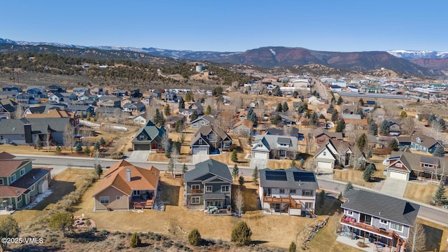 bird's eye view with a mountain view and a residential view