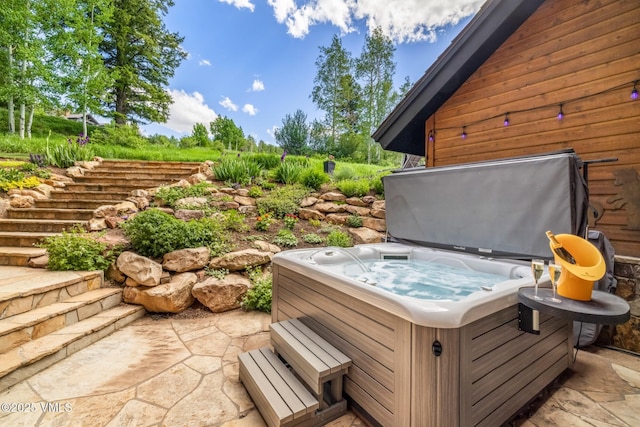 25 W Timber Draw Dr, Edwards, CO 81632 - view of patio with a hot tub and stairway