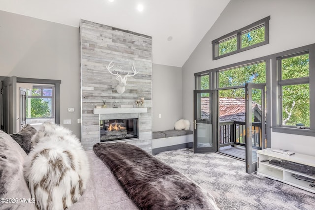 25 W Timber Draw Dr, Edwards, CO 81632 - living room with high vaulted ceiling, carpet, and a fireplace