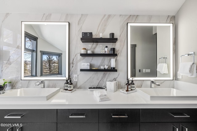 25 W Timber Draw Dr, Edwards, CO 81632 - bathroom with double vanity and decorative backsplash