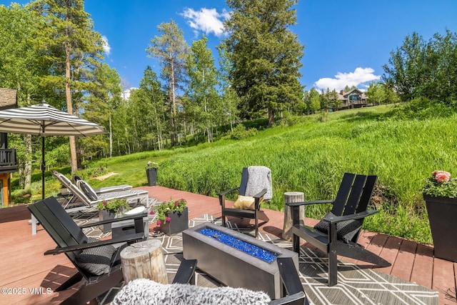 25 W Timber Draw Dr, Edwards, CO 81632 - view of patio / terrace featuring an outdoor fire pit and a deck