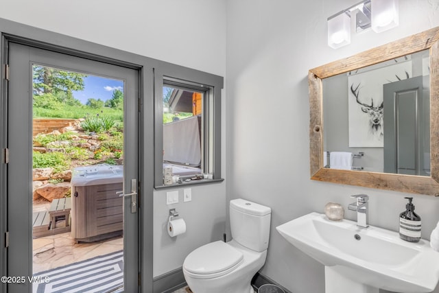 25 W Timber Draw Dr, Edwards, CO 81632 - half bathroom featuring a sink and toilet