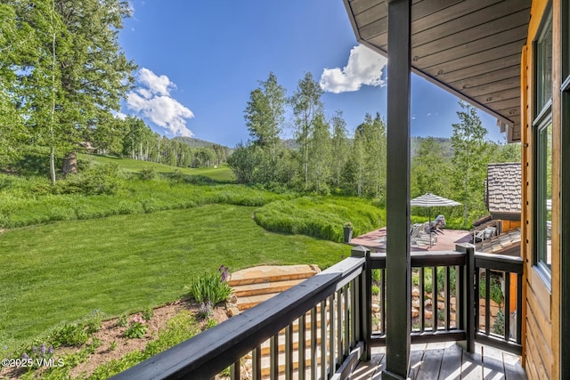 25 W Timber Draw Dr, Edwards, CO 81632 - view of wooden balcony featuring a wooden deck and a forest view