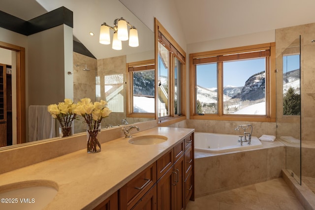 full bath with lofted ceiling, a mountain view, a sink, a jetted tub, and a tile shower