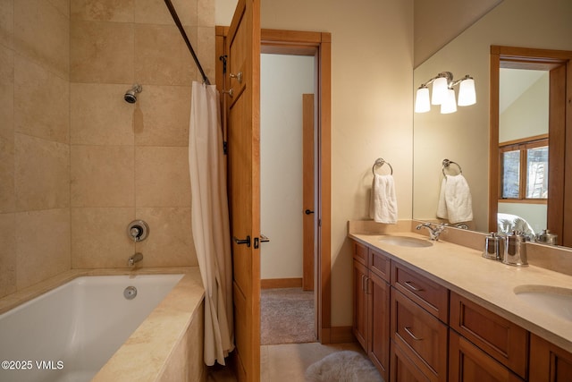 bathroom featuring shower / bath combo, a sink, baseboards, and double vanity