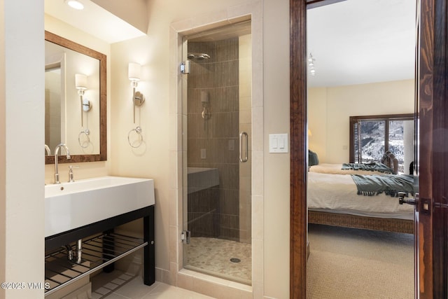 full bathroom with a stall shower and connected bathroom