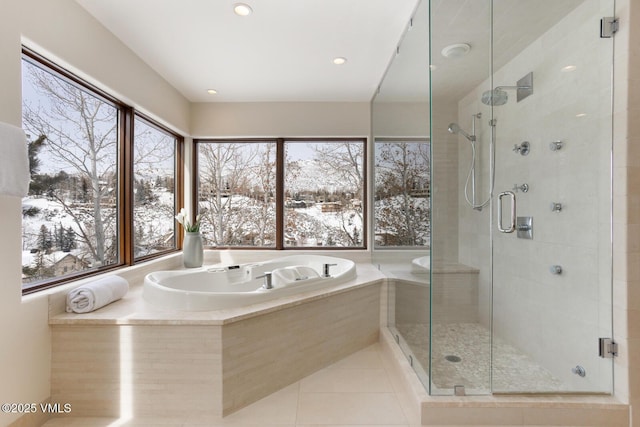 full bath featuring tile patterned flooring, a shower stall, a bath, and recessed lighting