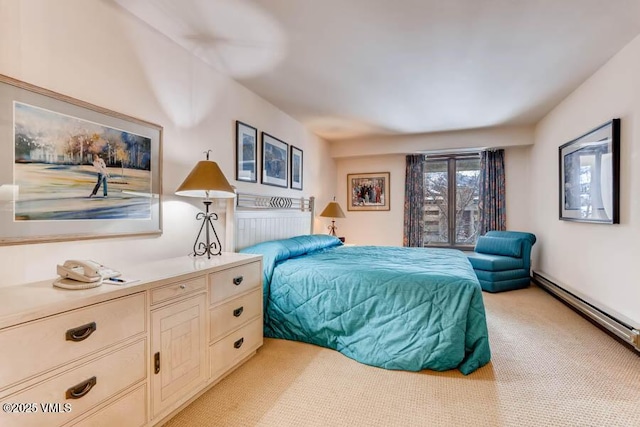 bedroom featuring a baseboard radiator and light colored carpet