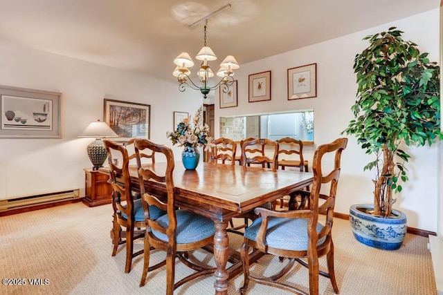 dining area featuring a baseboard radiator, a chandelier, baseboards, and light colored carpet