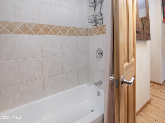 1050 W Beaver Creek Blvd Unit E-201, Avon, CO 81620 - bathroom featuring wood finished floors and bathtub / shower combination