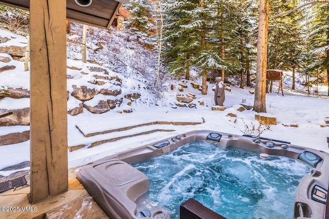 exterior space featuring a jacuzzi