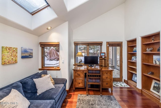 office space featuring recessed lighting, lofted ceiling with skylight, and wood finished floors