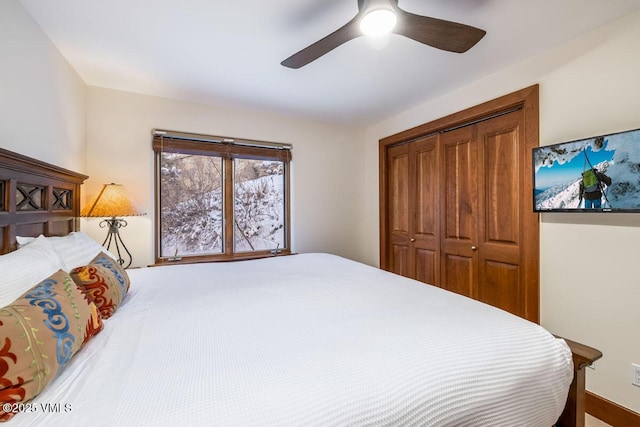 bedroom with a closet and a ceiling fan