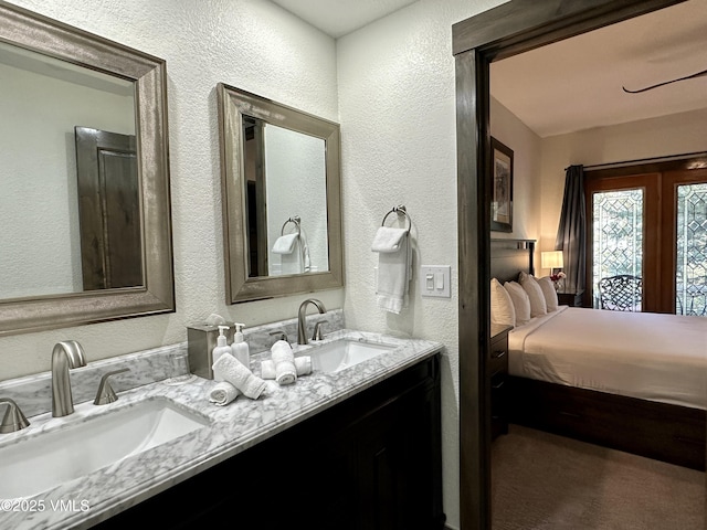 120 Offerson Rd Unit A160, Beaver Creek, CO 81620 - ensuite bathroom featuring a textured wall and double vanity