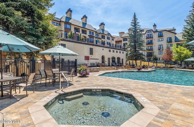120 Offerson Rd Unit A160, Beaver Creek, CO 81620 - community pool with a patio and a community hot tub