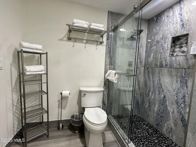120 Offerson Rd Unit A160, Beaver Creek, CO 81620 - full bath with a stall shower, toilet, and wood finished floors