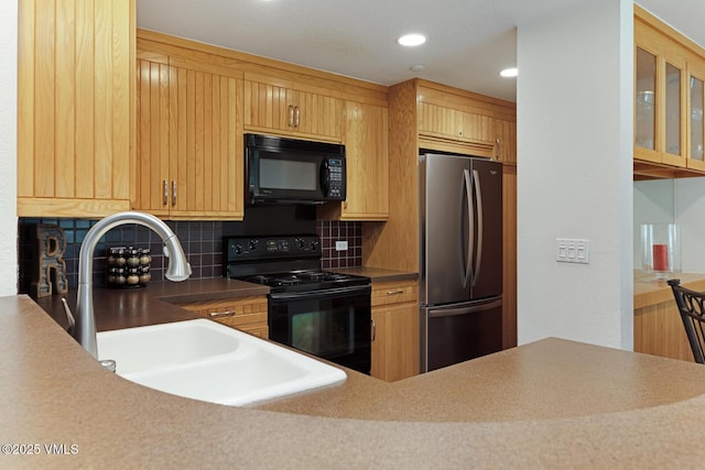 120 Offerson Rd Unit 2320, Beaver Creek, CO 81620 - kitchen with black appliances, decorative backsplash, and recessed lighting