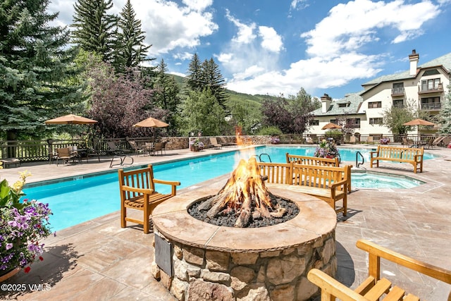 120 Offerson Rd Unit 2320, Beaver Creek, CO 81620 - community pool featuring a fire pit and a patio area